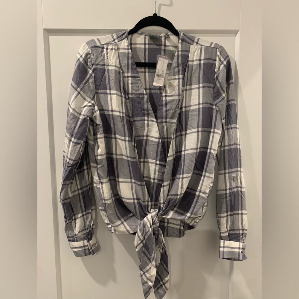Grey plaid tie bottom wrap style top. Size small. NWTs.
